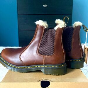 Brand new/Never worn Dr. Martens boots with fur trim.